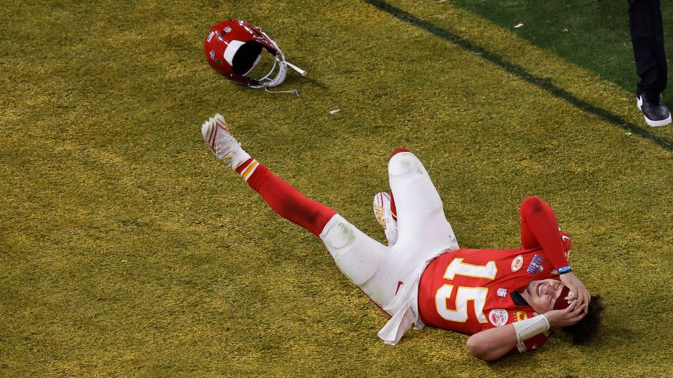Mahomes celebrates after throwing the game-winning touchdown against the San Francisco 49ers during overtime of Super Bowl LVIII. - Adam Hunger/AP