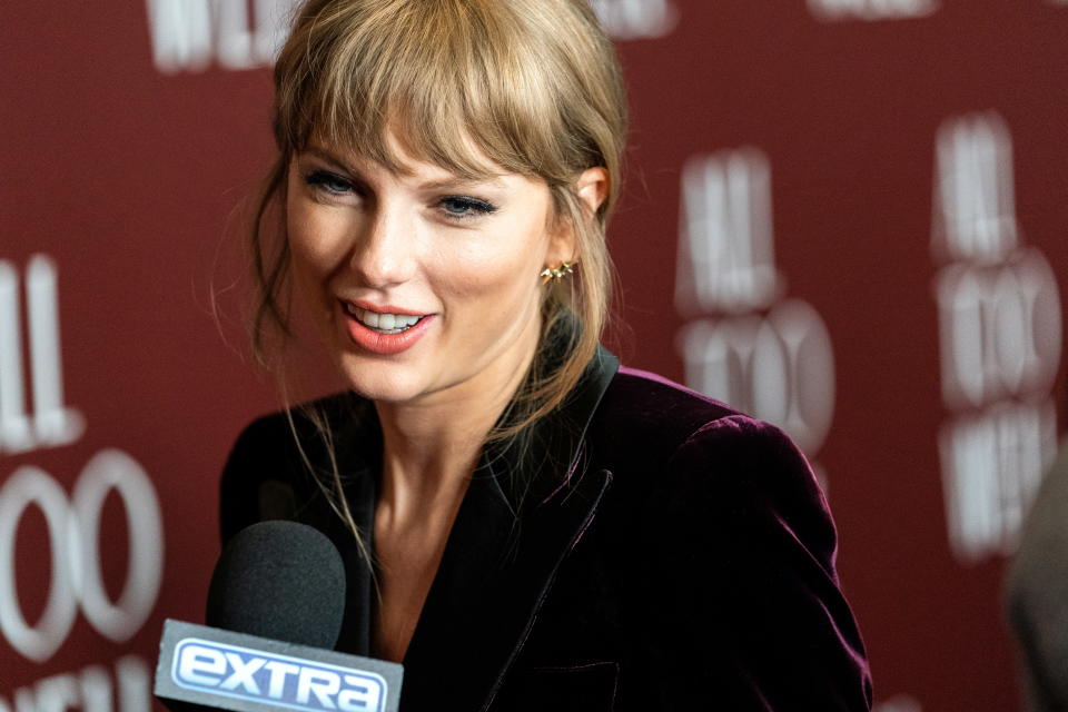 Singer Taylor Swift speaks with the media during the 