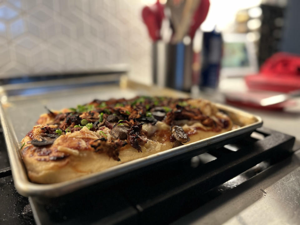 <p>A photo from the iPhone 14 showing a homemade pizza captured in Portrait mode.</p>
