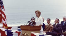 Then-first lady Pat Nixon speaks at the dedication of Frriendship Park in San Diego, on the border with Tijuana, Mexico, on Aug. 18, 1971. In the days before Joe Biden became president, construction crews worked quickly to finish Donald Trump's wall at an iconic cross-border park overlooking the Pacific Ocean that then-first lady Pat Nixon inaugurated in 1971 as symbol of international friendship. Biden on Wednesday, Jan. 20, 2021 ordered a "pause" on all wall construction within a week, one of 17 executive edicts issued on his first day in office, including six dealing with immigration. (Richard Nixon Presidential Library and Museum via AP)