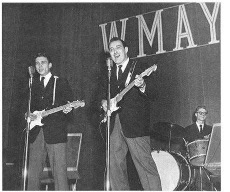 Waylon Jennings, at left, was recruited by fellow Texan Buddy Holly to play on the 'Winter Dance Party' tour in 1959. Music historian Sevan Garabedian said Jennings had recorded music with Holly before the tour. Jennings is seen here playing with Tommy Allsup as part of The Crickets' performance at the 'Shower of Stars' show at the Illinois State Armory on Feb. 15, 1959.