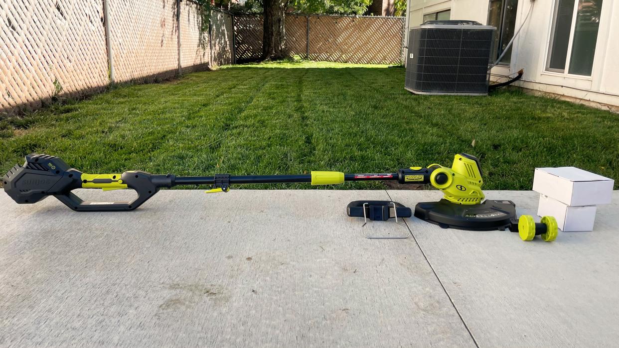  Sun Joe 24V-ST14 Cordless String Trimmer being tested in writer's home. 