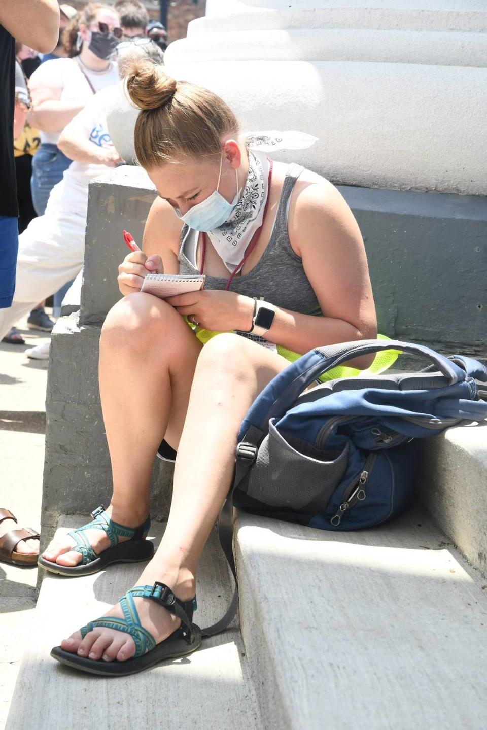 Herald-Leader reporter Taylor Six reports during a Black Lives Matter protest in Richmond, KY, in July 2020. Taylor Six