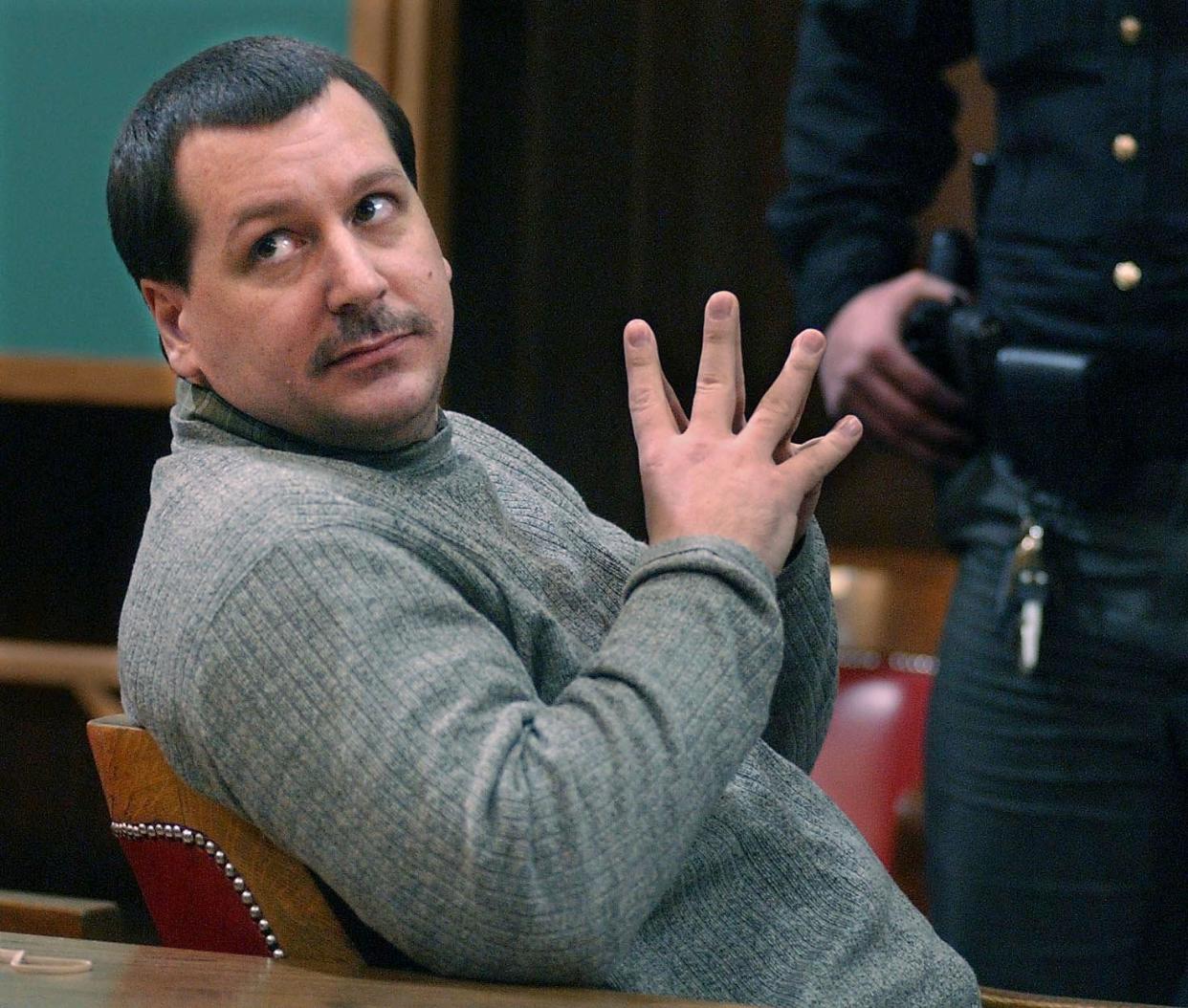 John Zaffino looks around Judge John Murphy's courtroom after he was given a guilty verdict for the murder of Jeff Zack on March 11, 2003.