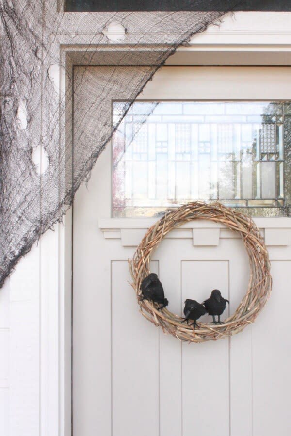 crow wreath door decoration (Twelve on Main)