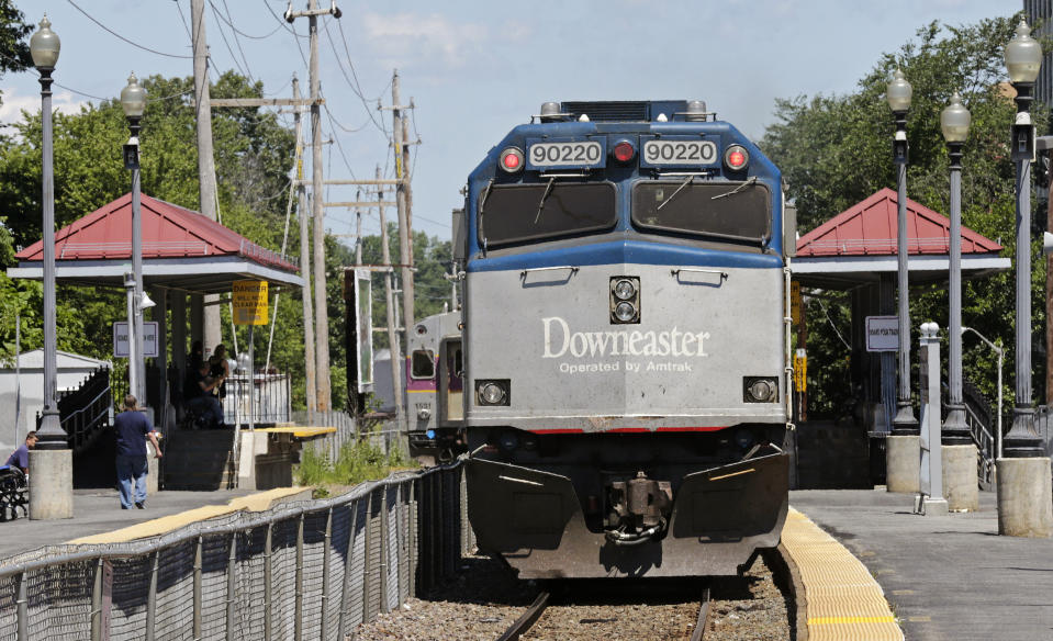 FILE - Amtrak's Downeaster train, headed from Boston to Portland, Maine, pulls out of the station in Haverhill, Mass., July 10, 2012. Riders on the Amtrak train that runs from Maine to Boston will soon have to hold off on buying alcoholic beverages during the 35-mile stretch of the trip that goes through New Hampshire. (AP Photo/Charles Krupa, File)