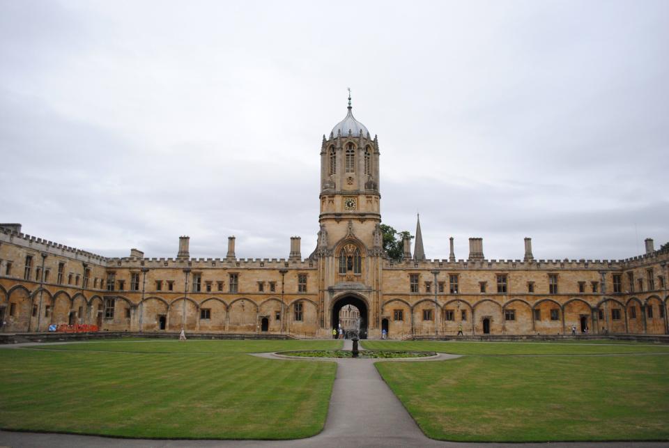 Oxford University is one of the most prestigious colleges in the world. Learn more about why it should not be missed by travelers in London. 
pictured: The Oxford University building and green space on a cloudy spring day 