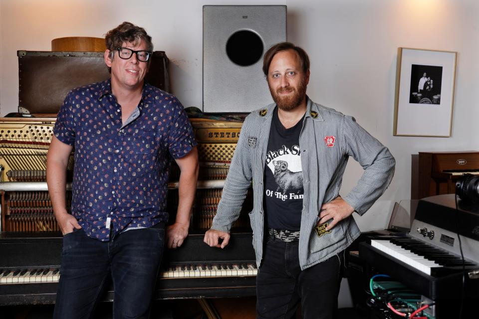 In this Aug. 19, 2019, photo, Patrick Carney, left, and Dan Auerbach of The Black Keys pose for a portrait in Nashville, Tenn. The Grammy-winning duo back with their ninth record called “Let’s Rock,” and a new tour starting Sept. 19 in Los Angeles. (AP Photo/Mark Humphrey) ORG XMIT: NYET557