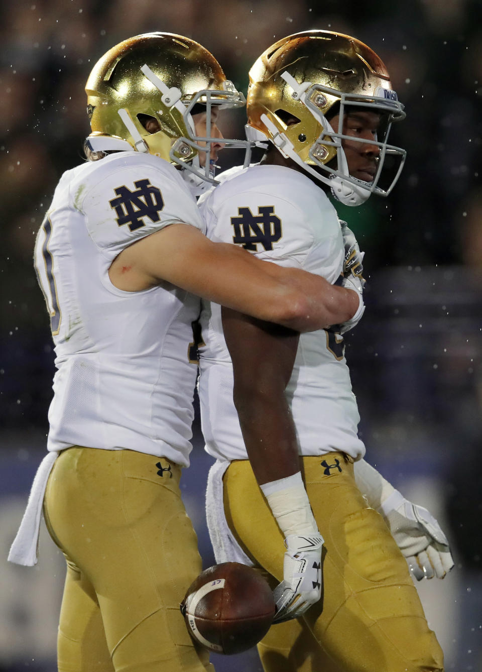 Notre Dame's Michael Young, right, celebrates his touchdown against Northwestern with Notre Dame's Chris Finke during the second half of an NCAA college football game Saturday, Nov. 3, 2018, in Evanston, Ill. (AP Photo/Jim Young)