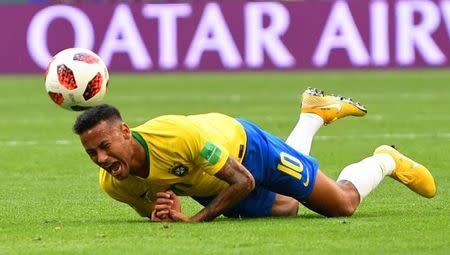 Soccer Football - World Cup - Round of 16 - Brazil vs Mexico - Samara Arena, Samara, Russia - July 2, 2018 Brazil's Neymar reacts during the match REUTERS/Dylan Martinez