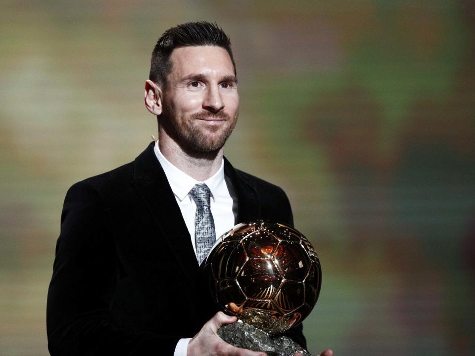 Lionel Messi collects his sixth Ballon d'Or at a ceremony in Paris: EPA