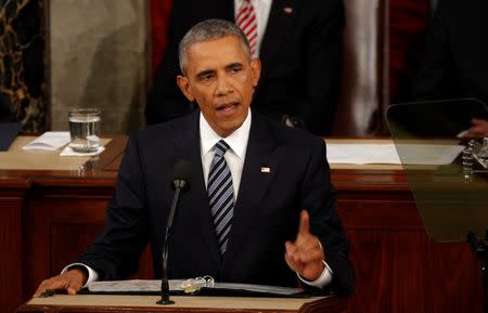 U.S. President Barack Obama delivers his State of the Union address to a joint session of Congress in Washington, January 12, 2016. REUTERS/Carlos Barria -