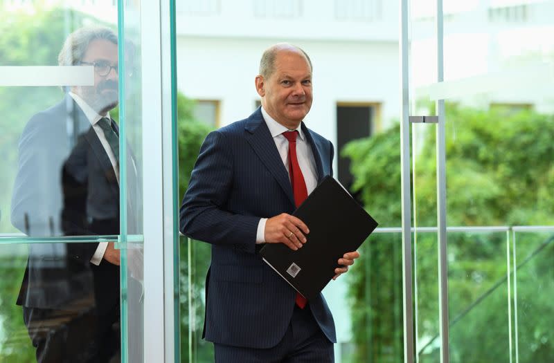 German Finance Minister Olaf Scholz attends a news conference in Berlin