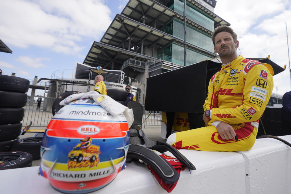 Romain Grosjean, of France, waits to drive during testing at Indianapolis Motor Speedway, Thursday, April 21, 2022, in Indianapolis. (AP Photo/Darron Cummings)