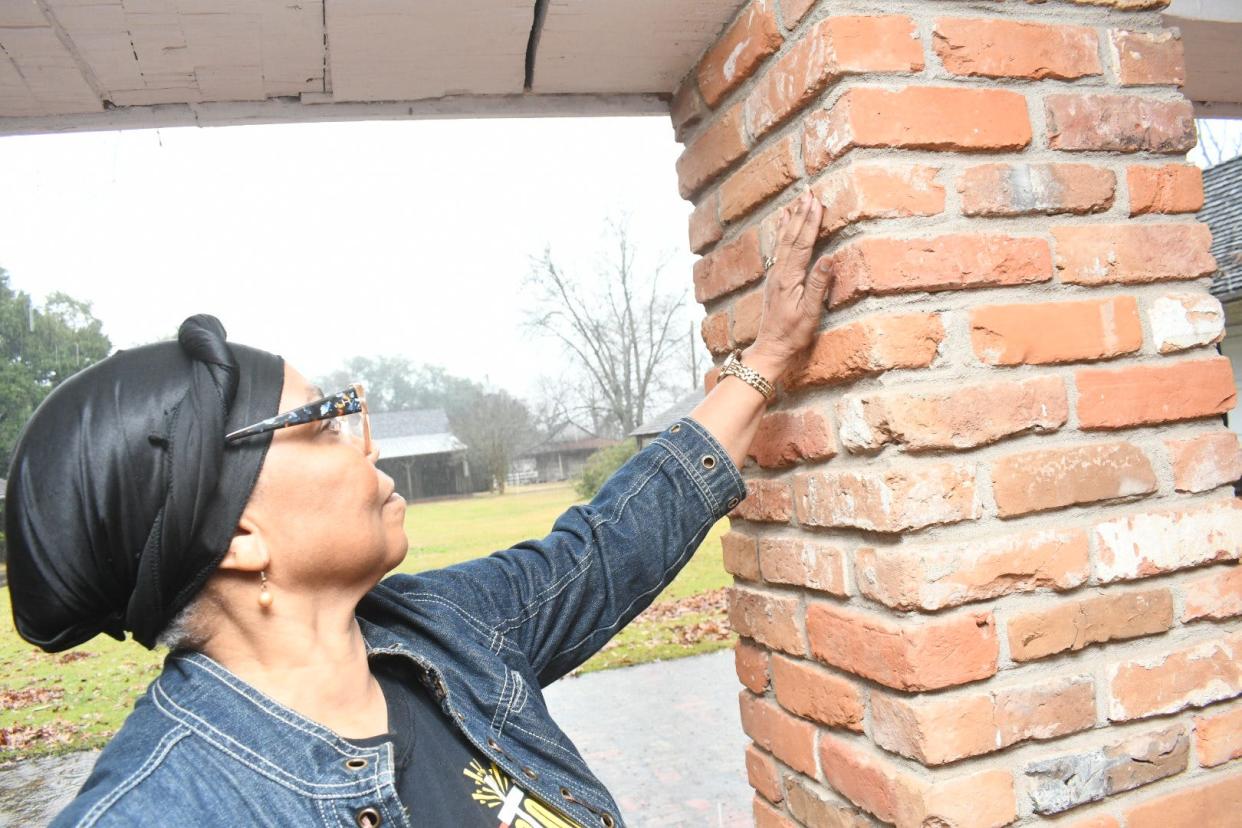 Shelia Draper of Simmsport felt a connection with the unknown enslaved person who made these fingerprint indentions in the handmade brick Kent Plantation House. For her and husband Leslie Draper, this was the most moving part of Kent House’s Black History Month tour, “The Enslaved Experience in Cenla: Living in Bondage.”