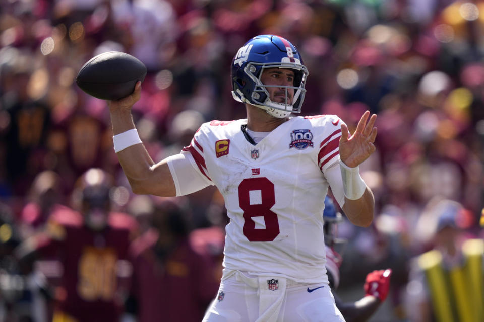 New York Giants quarterback Daniel Jones (8) looks to pass against the Washington Commanders during the first half of an NFL football game in Landover, Md., Sunday, Sept. 15, 2024. (AP Photo/Matt Slocum)