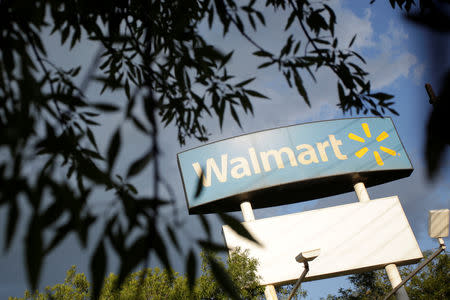 FILE PHOTO: A Walmart sign is pictured at one of their stores in Monterrey, Mexico, August 8, 2018. REUTERS/Daniel Becerril
