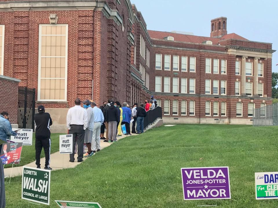 First State voters line up early outside P.S. DuPont Middle School to cast their vote in the Delaware Primary.