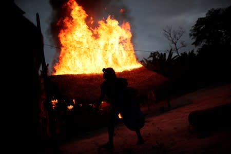 The Wider Image: Fighting fire with fire, Amazon 'forest guardians' stalk loggers