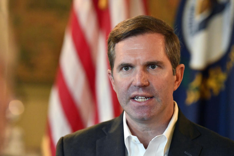 Kentucky Governor Andy Beshear responds to a question during an interview in Frankfort, Ky., Tuesday, Dec. 19, 2023. (AP Photo/Timothy D. Easley)