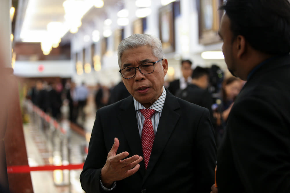 Pasir Gudang MP Hassan Abdul Karim speaks to reporters at the Parliament lobby in Kuala Lumpur March 14, 2019. — Picture by Ahmad Zamzahuri