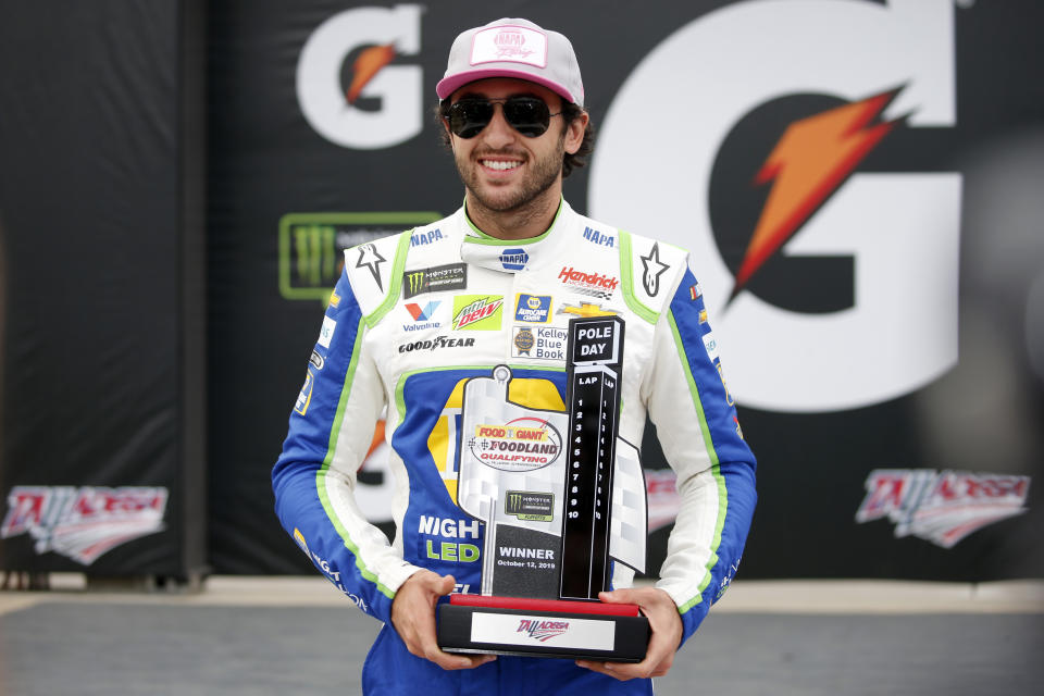 Monster Energy NASCAR Cup Series driver Chase Elliott wins the pole for the 1000Bulbs.com 500 at Talladega Superspeedway, Saturday, Oct 12, 2019, in Talladega, Ala. (AP Photo/Butch Dill)