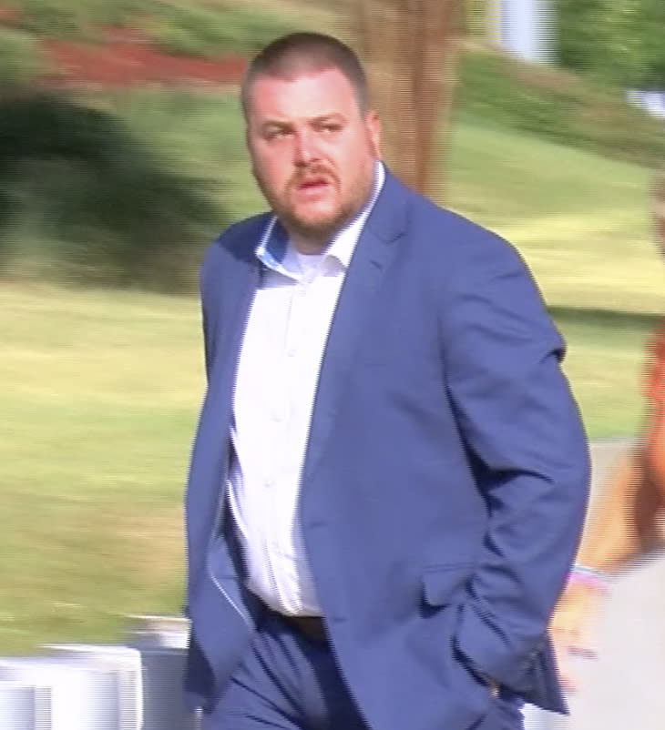 In this image taken from video, Christian Dedmon, a former sheriff's deputy in Rankin County, Miss.,, walks into the federal courthouse in Jackson, Miss., on Thursday, Aug. 3, 2023. Dedmon and five other former law enforcement officers pleaded guilty Thursday to a racist assault on two Black men in a home raid that ended with an officer shooting one man in the mouth. (Jerome DeLoach/WLBT via AP)