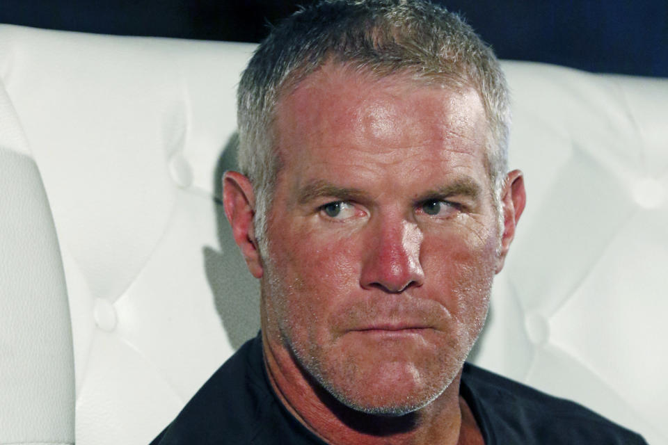 FILE - Former NFL quarterback Brett Favre participates in a question-and-answer session at a fundraiser for the Willowood Developmental Center, a facility that provides training and support for students with special needs, on Wednesday, Oct. 17, 2018, in Jackson, Mississippi. (AP Photo/Rogelio V. Solis, File)