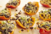 <p>Venture south of the border for dinner with these 20-minute stuffed peppers.</p><p>Get the recipe from <a href="https://www.delish.com/cooking/recipe-ideas/recipes/a43193/stuffed-peppers-corn-black-beans-pepperjack-recipe/" rel="nofollow noopener" target="_blank" data-ylk="slk:Delish;elm:context_link;itc:0;sec:content-canvas" class="link ">Delish</a>.<br></p>