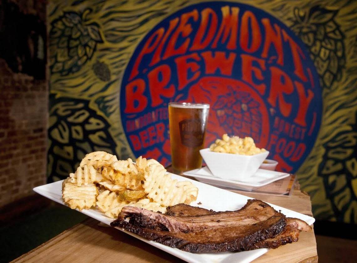 Smoked brisket with waffle fries and mac ‘n’ cheese along with a Heart of Gold Blonde Ale at Piedmont Brewery & Kitchen.