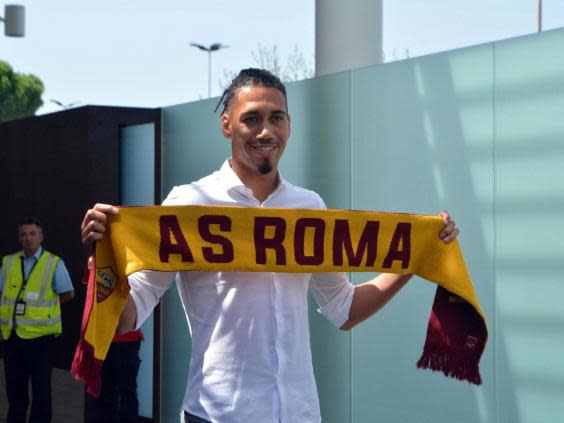 Chris Smalling arrives at Ciampino Airport (EPA)