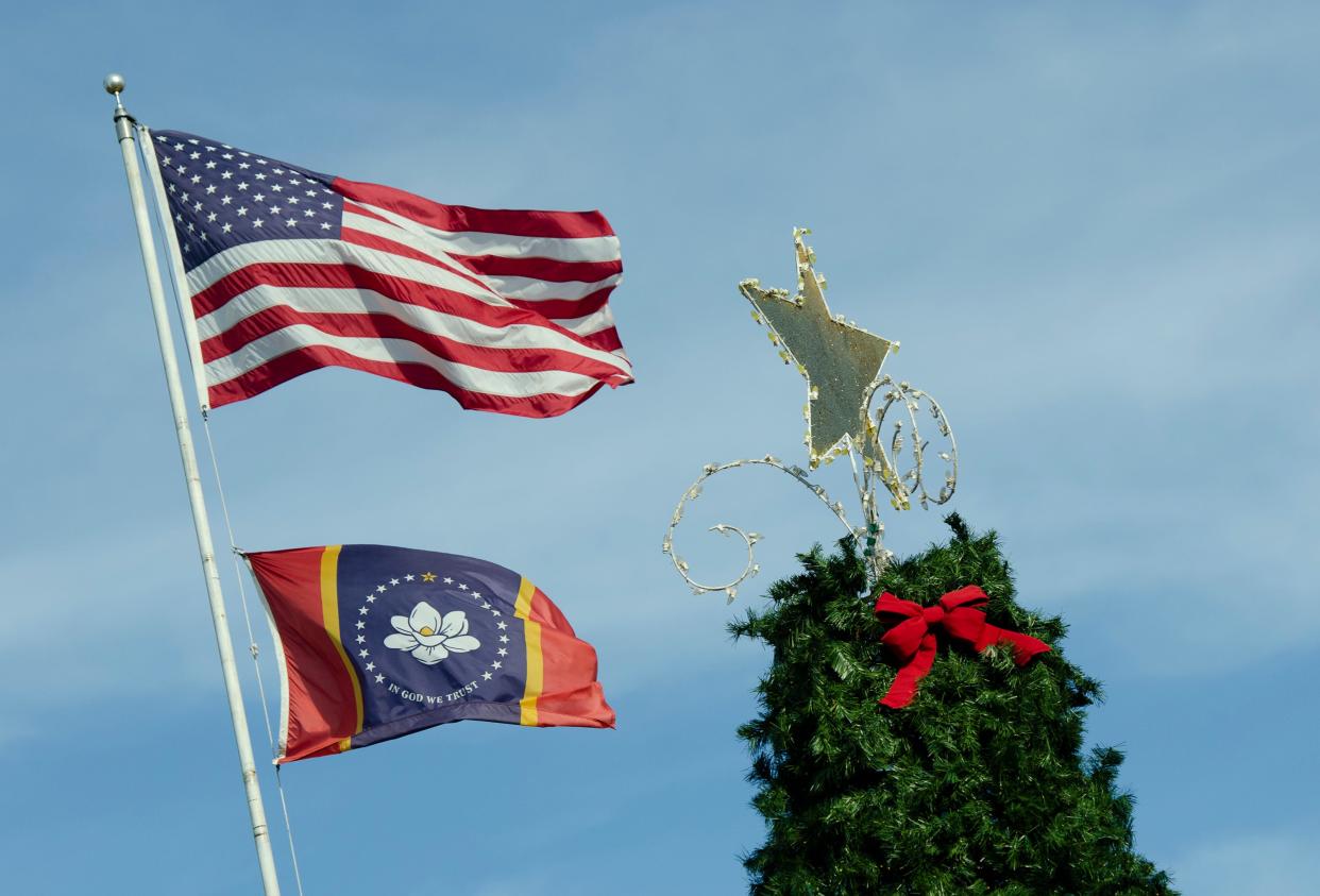 The winds are blowing toward Christmas in Canton Monday, Dec. 22, 2021, as the opening of the annual Canton, Miss., festival approaches. The holiday event that blankets Canton Square with lights includes rides, parades, and Santa and Mrs. Clause. Christmas in Canton begins Nov. 26 and runs through Dec. 24.