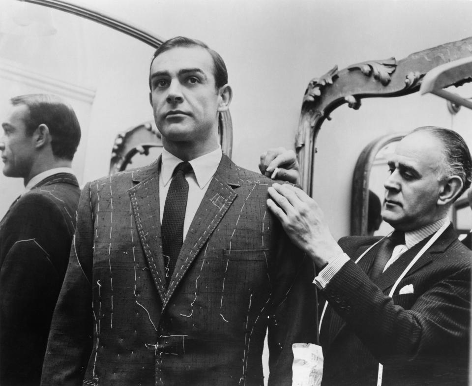 Tailor Anthony Sinclair fitting Scottish actor Sean Connery for one of the suits he will wear in the film 'From Russia With Love', Mayfair, London, 1963. (Photo by United Artists/Archive Photos/Getty Images)