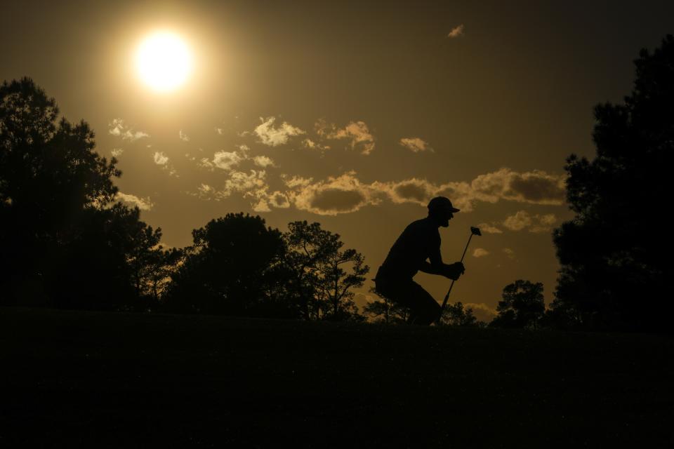 Dustin Johnson reacts after a putt on the 17th green during the first round at the Masters golf tournament on Thursday, April 7, 2022, in Augusta, Ga. (AP Photo/Matt Slocum)