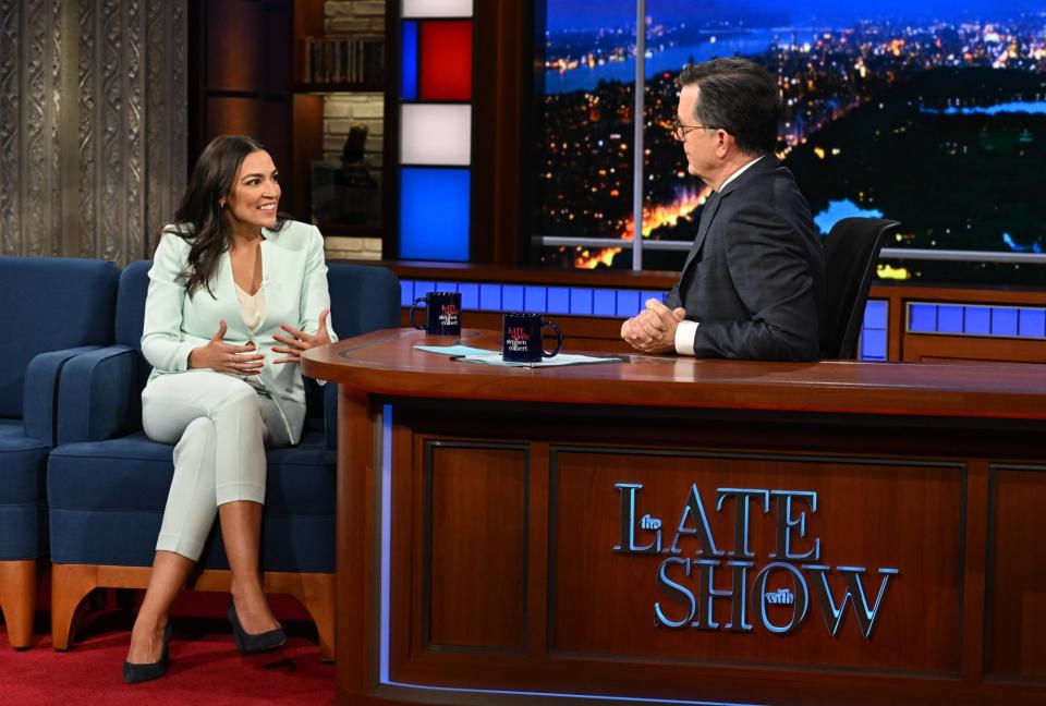 Tahari ASL blazer and pants suit, Rep. Alexandria Ocasio-Cortez on 'The Late Show With Stephen Colbert' 