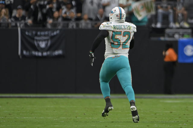 Miami Dolphins' Elandon Roberts returns pick of Derek Carr 85