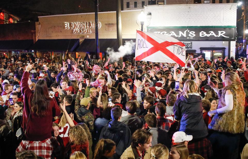 Students celebrate on the Strip on Jan. 9, 2018, after the University of Alabama football team won the national championship game. On Thursday, the Tuscaloosa Police Department announced a set of safety measures for the Strip that will be in place for the 2023 season.