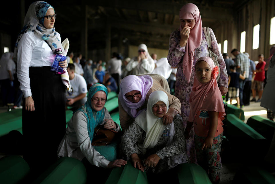 Women cry for newly identified victims of the 1995 Srebrenica massacre