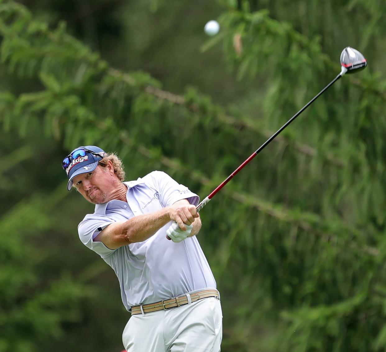 Tim Petrovic sends his ball down the fairway on the 13th hole during second round of the Bridgestone Senior Players Tournament at Firestone Country Club on Friday.