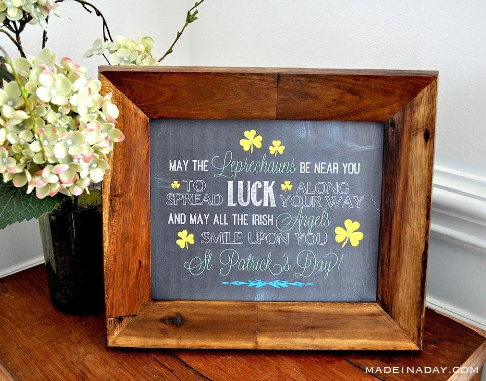 chalk art framed irish blessing sitting on a table beside a vase of hydrangeas