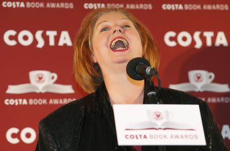 Author Hilary Mantel reacts as she makes a joke while accepting her award for the overall prize for her book "Bring up the Bodies" at the Costa Book Awards in central London, January 29, 2013. Mantel won the award for best overall book. REUTERS/Andrew Winning