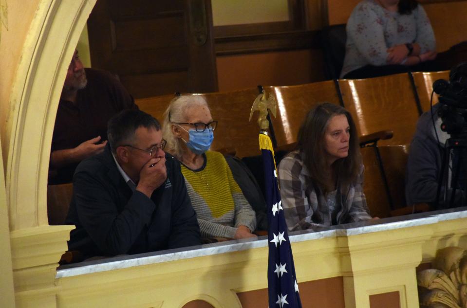 The family of Joe Boever, (from left) Nick Nemec, Dorothy Boever and Jennifer Boever, sit in the House of Representatives gallery Tuesday as lawmakers debated impeachment articles for Attorney General Jason Ravnsborg on Tuesday, April 12, 2022.