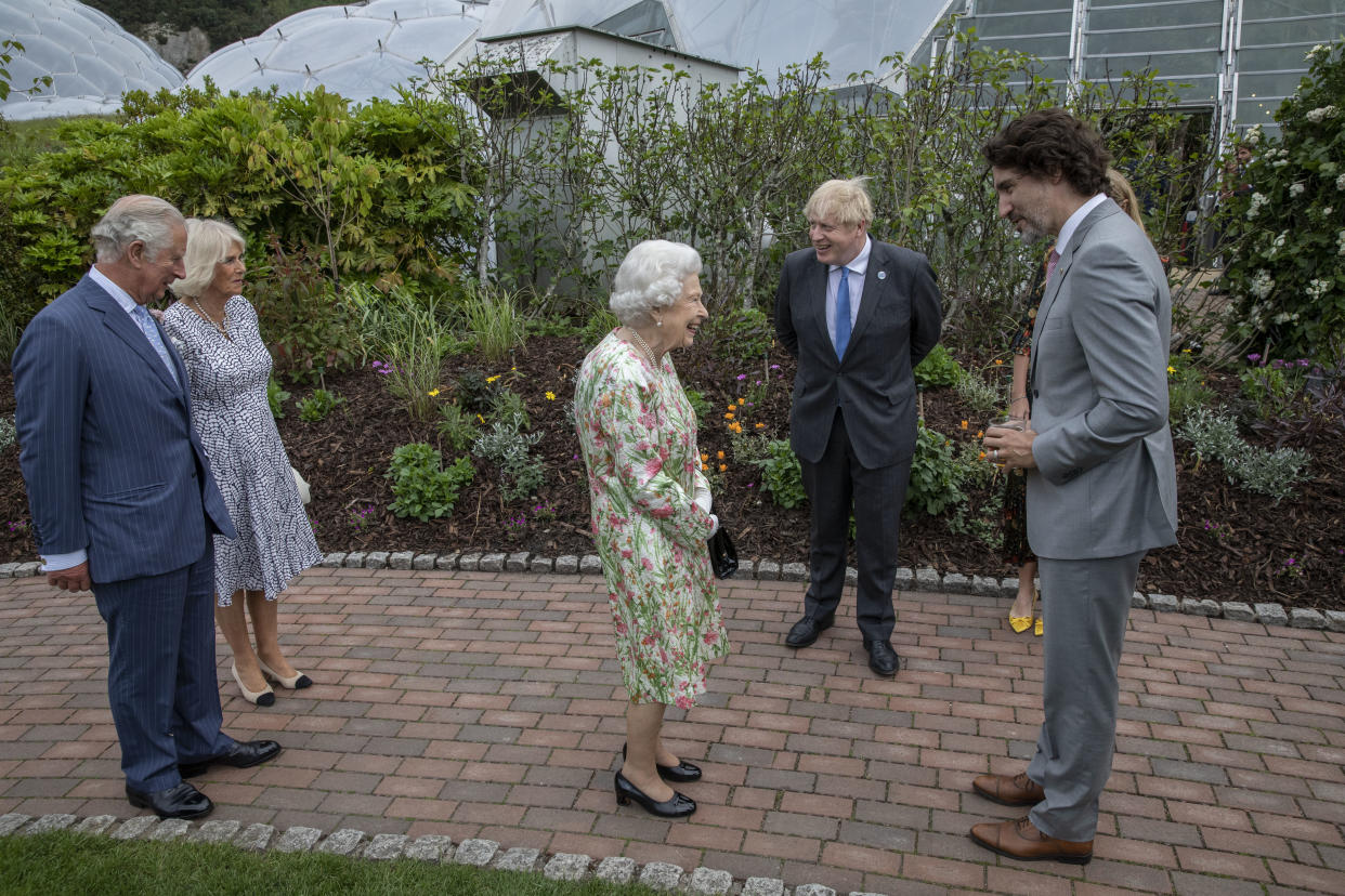 ST AUSTELL, ENGLAND - JUNE 11: Prince Charles, Prince of Wales, Camilla, Duchess of Cornwall, British Prime Minister Boris Johnson, wife Carrie Johnson, Queen Elizabeth II and Canadian Prime Minister Justin Trudeau chat at a drinks reception for Queen Elizabeth II and G7 leaders at The Eden Project during the G7 Summit on June 11, 2021 in St Austell, Cornwall, England. UK Prime Minister, Boris Johnson, hosts leaders from the USA, Japan, Germany, France, Italy and Canada at the G7 Summit. This year the UK has invited India, South Africa, and South Korea to attend the Leaders' Summit as guest countries as well as the EU. (Photo by Jack Hill - WPA Pool / Getty Images)   chat at a drinks reception for Queen Elizabeth II and G7 leaders at The Eden Project during the G7 Summit on June 11, 2021 in St Austell, Cornwall, England. UK Prime Minister, Boris Johnson, hosts leaders from the USA, Japan, Germany, France, Italy and Canada at the G7 Summit. This year the UK has invited India, South Africa, and South Korea to attend the Leaders' Summit as guest countries as well as the EU. (Photo by Jack Hill - WPA Pool / Getty Images)