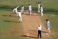 Cricket - India v England - Fourth Test cricket match - Wankhede Stadium, Mumbai - 12/12/16. India's players celebrate the wicket of England's Jonny Bairstow. REUTERS/Danish Siddiqui