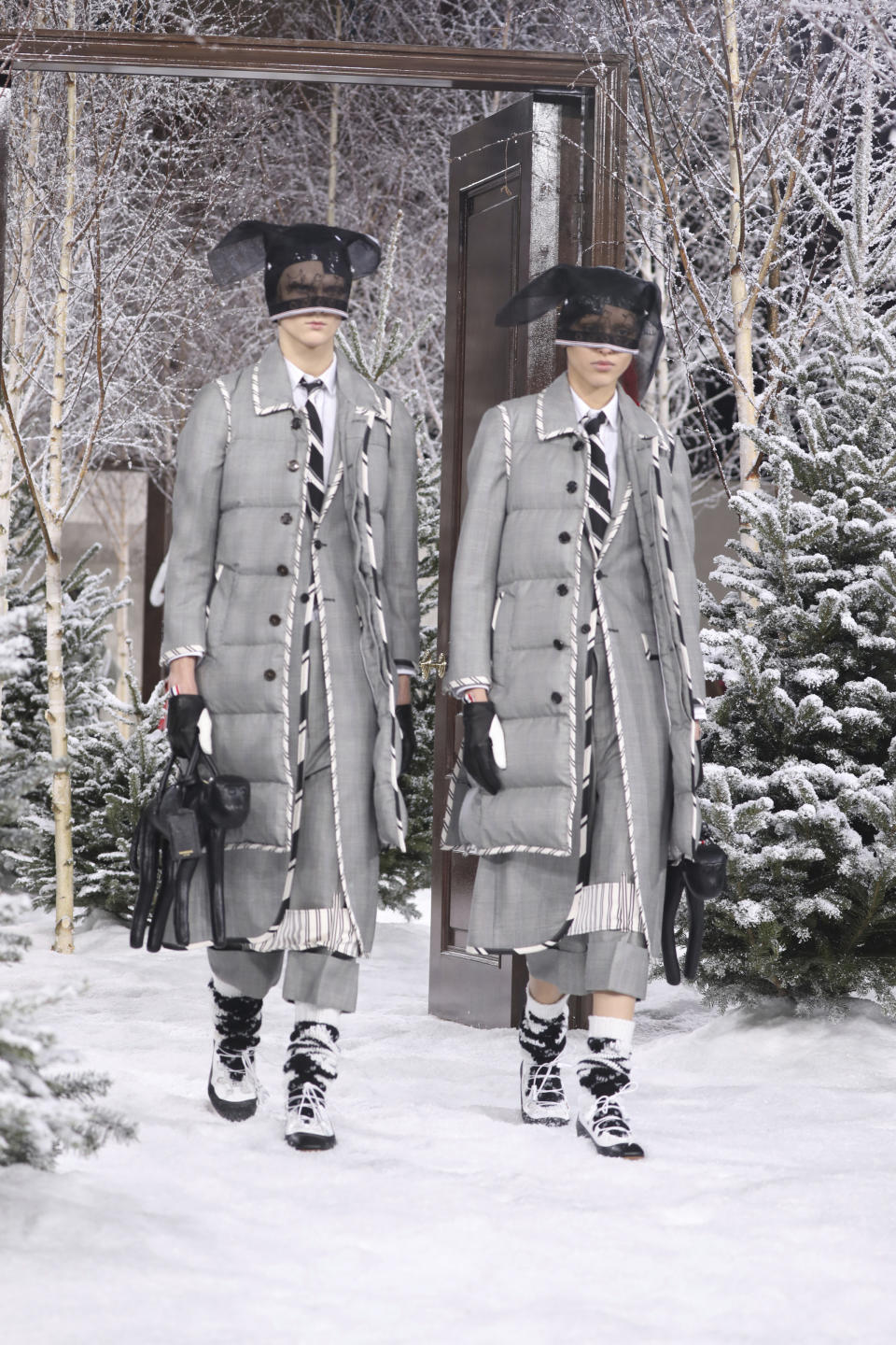 Models wear creations for the Thom Browne fashion collection during Women's fashion week Fall/Winter 2020/21 presented in Paris, Sunday, March 1, 2020. (Photo by Vianney Le Caer/Invision/AP)