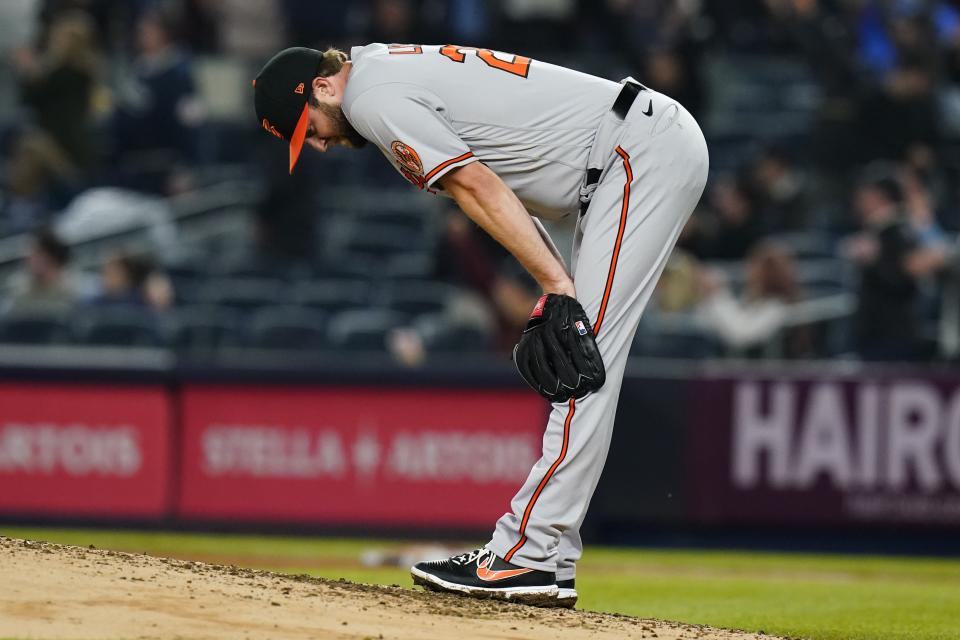 Baltimore Orioles' Jordan Lyles reacts as New York Yankees' Anthony Rizzo runs the bases after hitting a three-run home run during the third inning of a baseball game Tuesday, April 26, 2022, in New York. (AP Photo/Frank Franklin II)