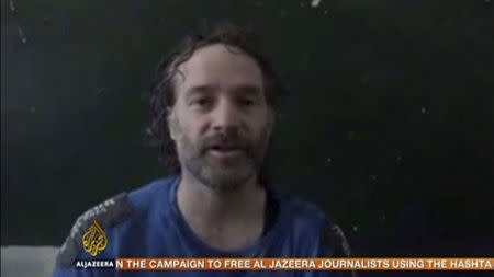 U.S. journalist Peter Theo Curtis is shown in this undated still frame taken from video courtesy of Al Jazeera on August 24, 2014. REUTERS/Al Jazeera/Handout via Reuters