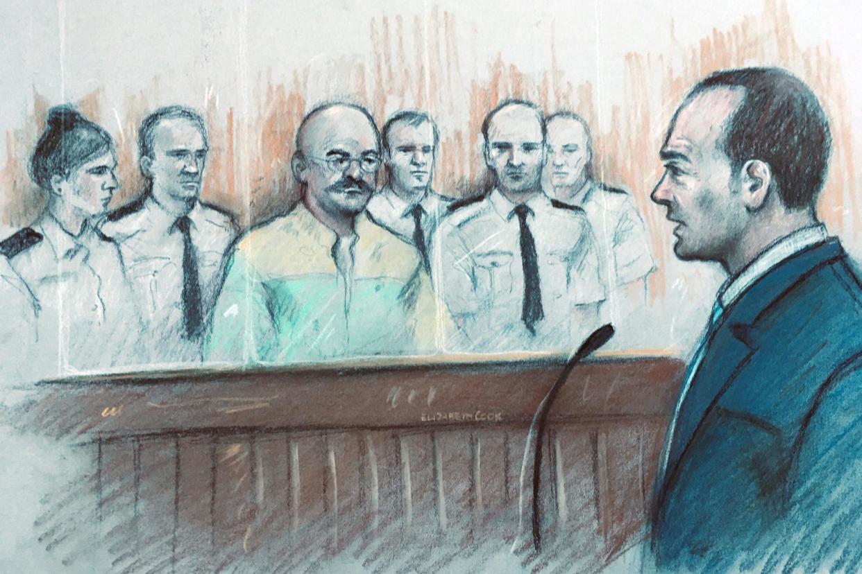 Court sketch of Charles Bronson listening to Mark Docherty give evidence at Leeds Crown Court: PA