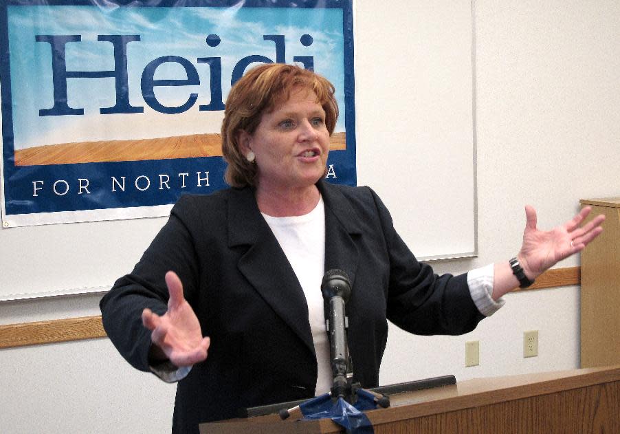 FILE - In this May 3, 2012, file photo, North Dakota Democratic Senate candidate Heidi Heitkamp speaks in Minot, N.D. North Dakota’s prosperity from an energy boom as the rest of the country slowly crawls out from under a collapsed economy four years ago is making a contest of a Senate race that Democrats had all but conceded. (AP Photo/Dale Wetzel, File)