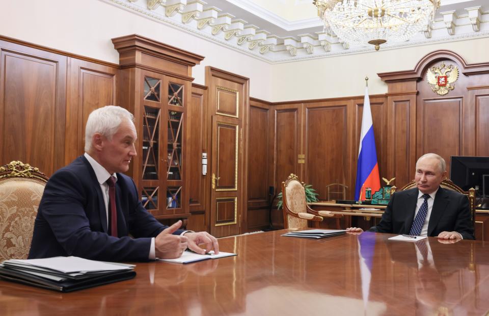 Russian President Vladimir Putin, right, listens to Russian First Deputy Prime Minister Andrei Belousov during their meeting at the Kremlin, in Moscow, Russia, Tuesday, Nov. 7, 2023. (Gavriil Grigorov, Sputnik, Kremlin Pool Photo via AP)